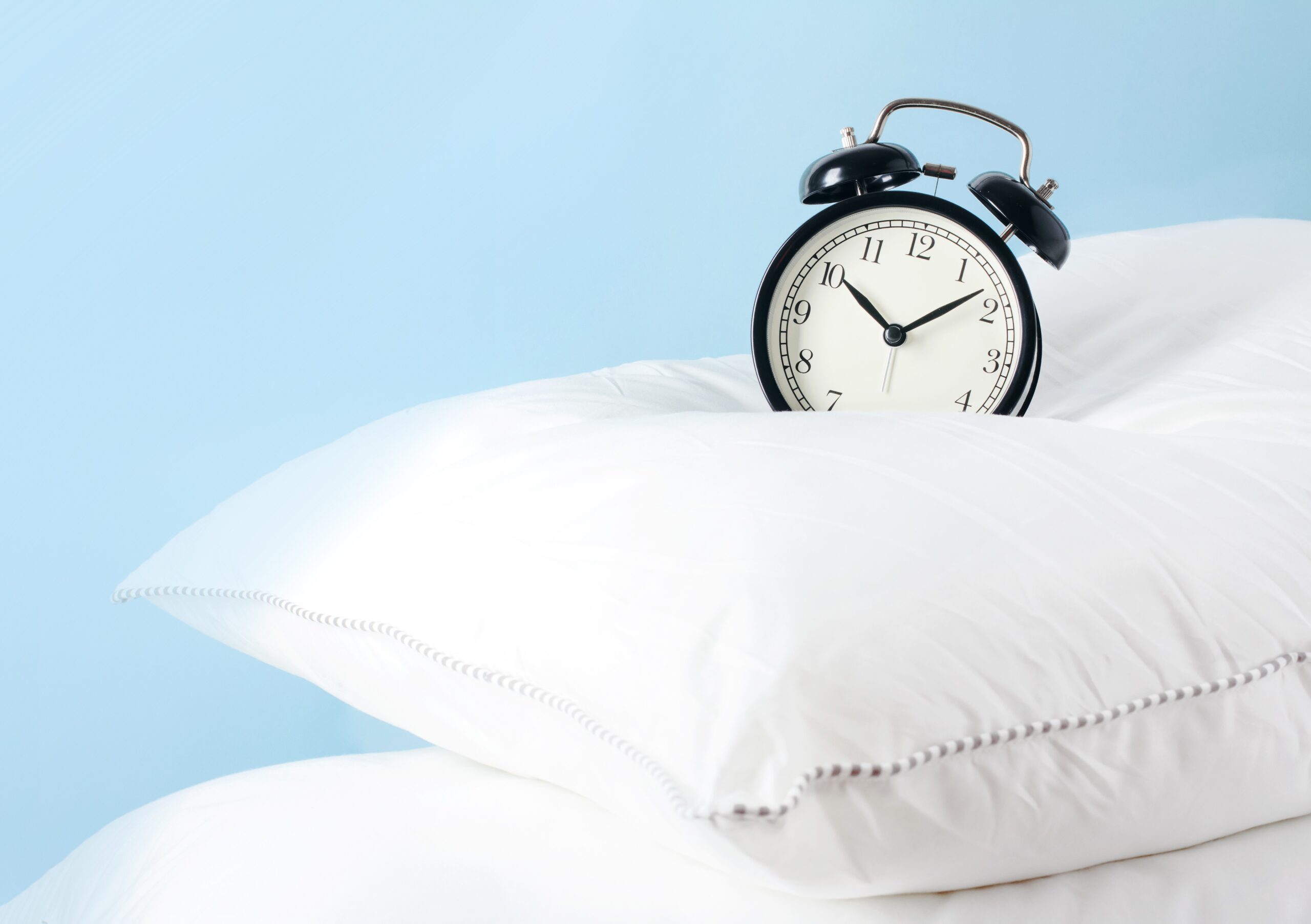 sleep Alarm clock on pillows