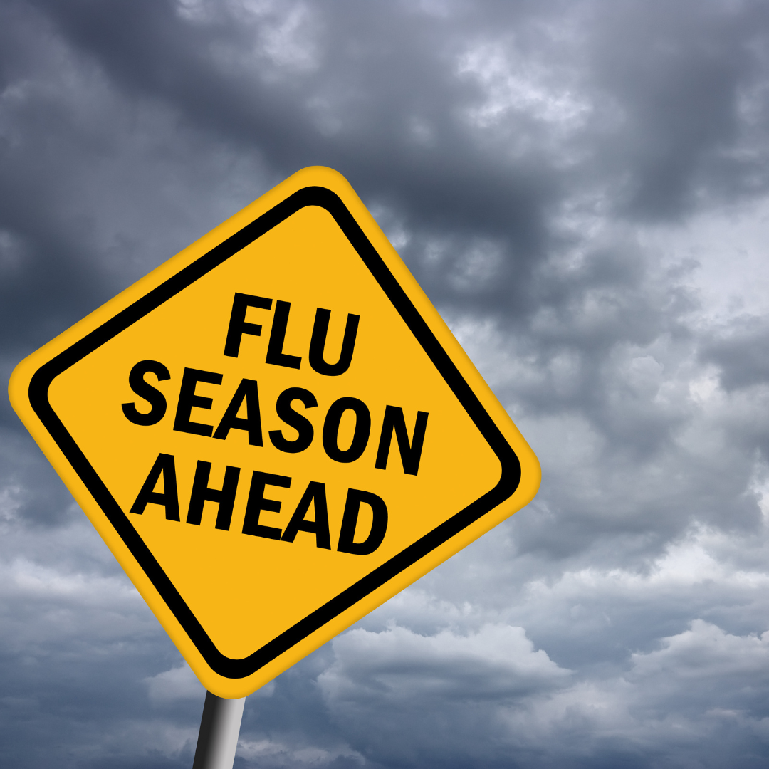yellow flu season ahead sign with black trim